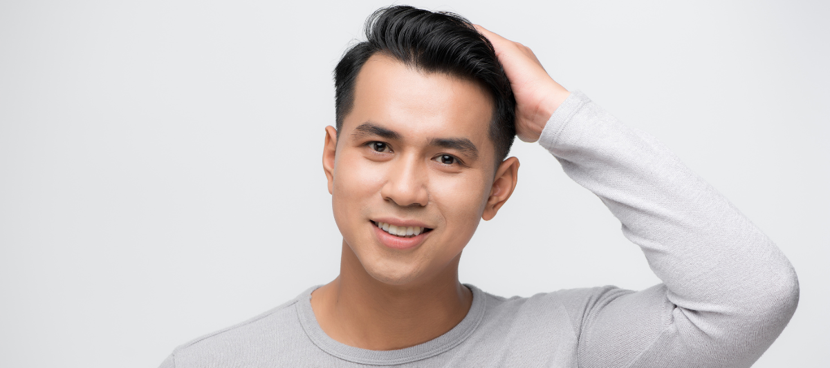 Handsome Asian Man with Healthy Hair